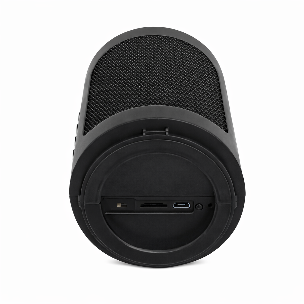 Bottom view of spy camera Bluetooth speaker with hidden 1080p lens, micro SD slot and USB charging port, black compact speaker on a white background