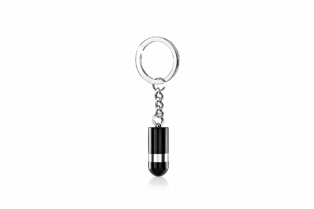 Mini digital voice recorder keychain version 32GB in black and silver capsule design on a white background